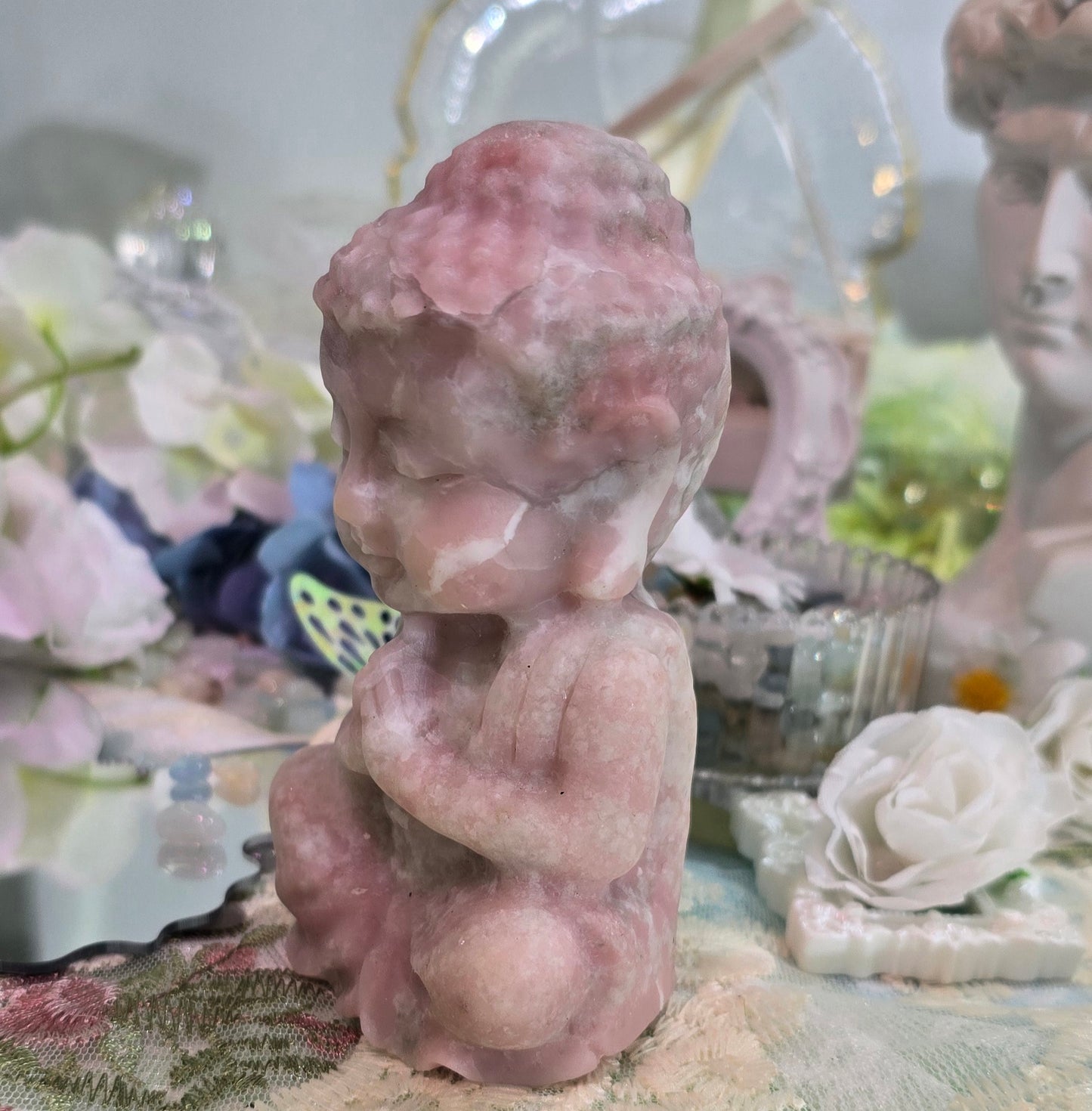 Natural crystal-pink opal Buddha carving