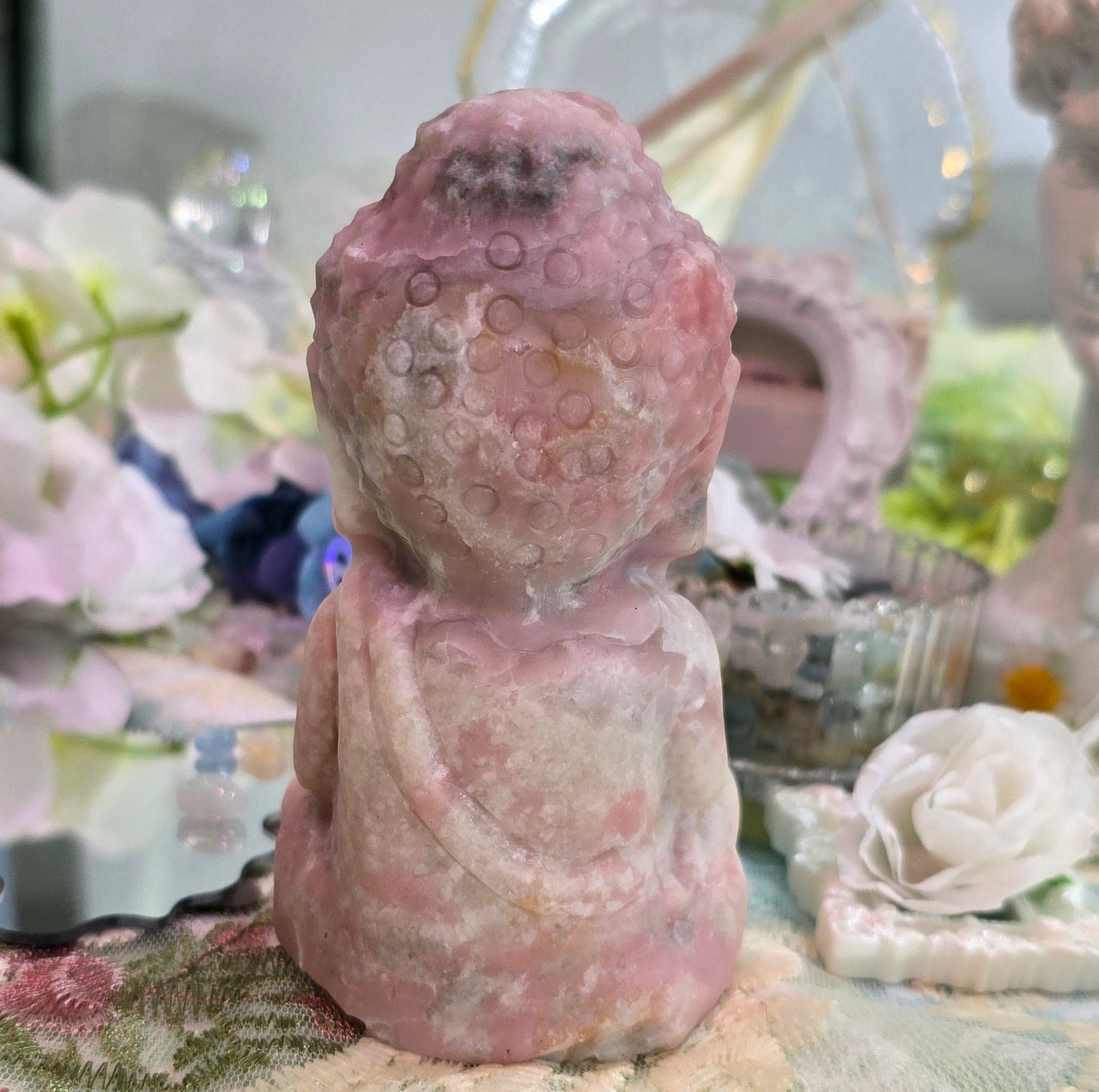 Natural crystal-pink opal Buddha carving