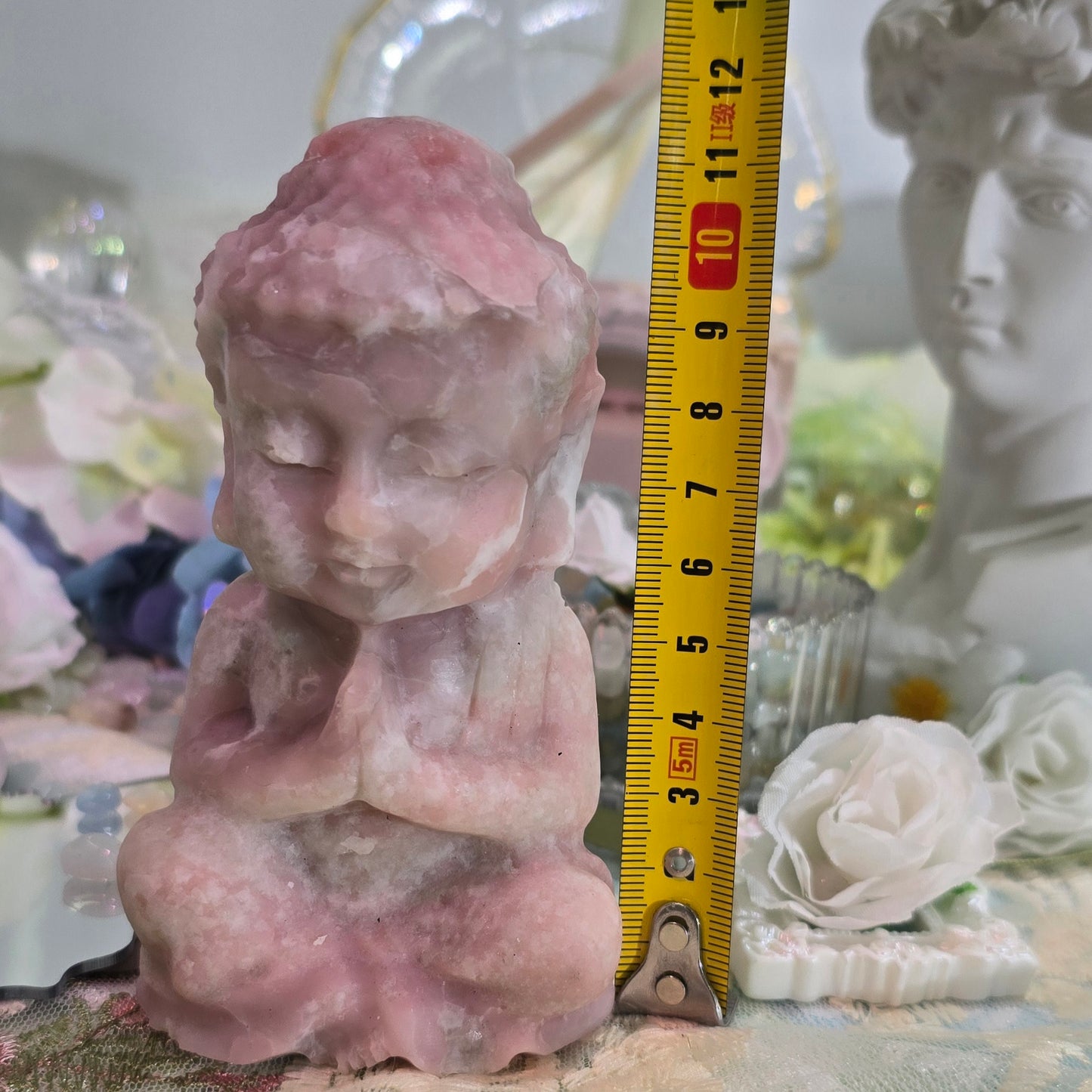 Natural crystal-pink opal Buddha carving